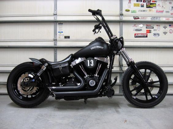 2010 H-D Street Bob with Vance & Hines short shots and black denim paint. Very nice. This is my