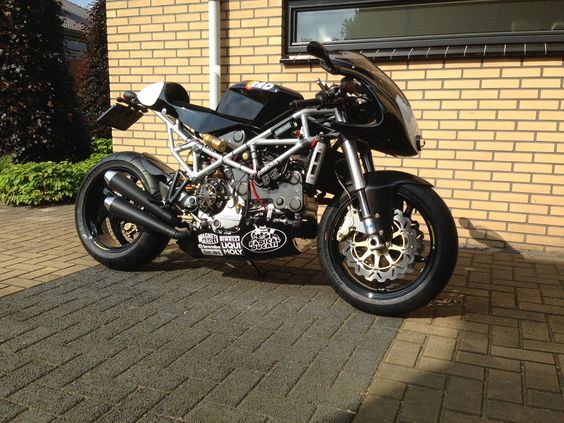 A street legal Radical STR, based on a 2001 ST4S by Abarthracing, Uden Netherlands.  Specs: On the bike is mounted: S2r swingarm, with 998 rear rim and carbon rear fender, Front and rear wave disks, with Brembo calipers, 1098 gas tank, 1098R carbon front fender, Koso digital dash, Custom made exhaust system, with modified megaton dampers, Radical belly pan, Radical tophalf, with elipsoid Xenon  S4 cooling system, with double fan and sillicone hoses, Pipercross air filters