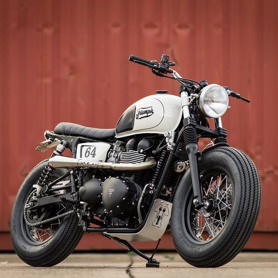 After a series of dark and moody Triumph Bonnevilles @downandoutcaferacers have mixed a bit of classic style with their super popular 16