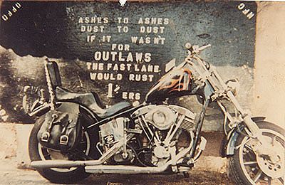 ashes to ashes dust to dust if it wasn't for outlaws the fast alne would rust I like this quote with motorcycle photo