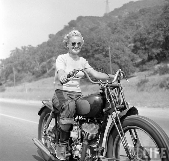 Bike Girls (on Miss Moss) photo series of women motorcyclists from 1949, taken by Loomis Dean for Life Magazine.