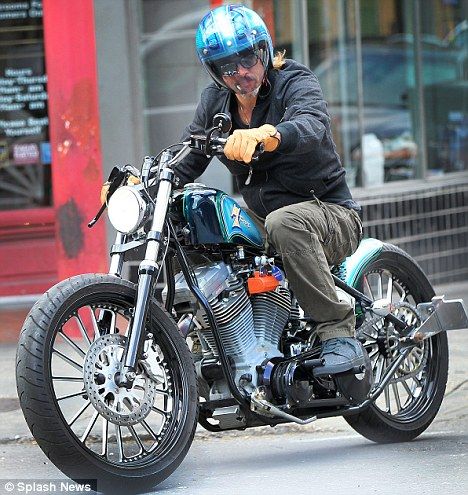 Brad Pitt on Motorcycle. Yes.