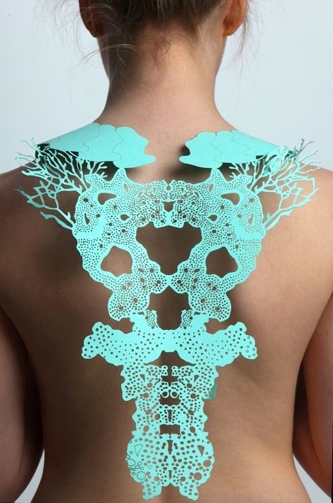 by Jasmine Bowden | Laser cut paper back jewellery inspired by sea forms. | Photography by James Mann.