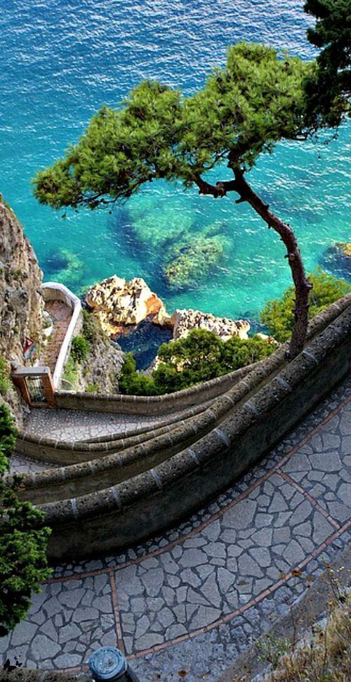 Capri, Italy. Relish ocean breezes and seaside scenery on a boat ride to the picturesque island before roaming the villa-lined streets.