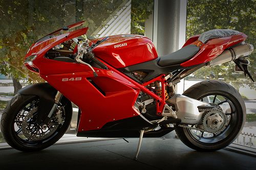 Ducati 848. Want one so bad. Mom said she buy me one after graduation.