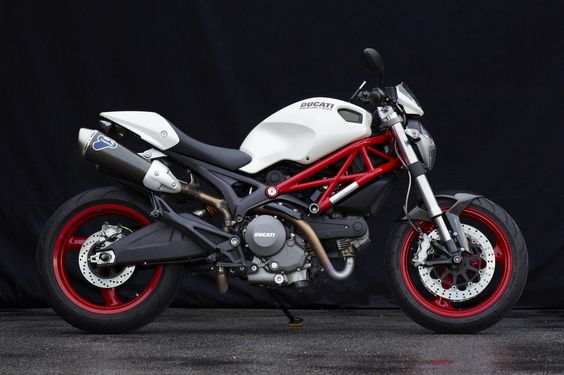 Ducati Monster 696 -Love the red frame against the white!