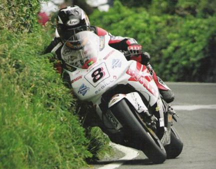 Extreme gardening: Guy Martin cuts the hedge at the TT