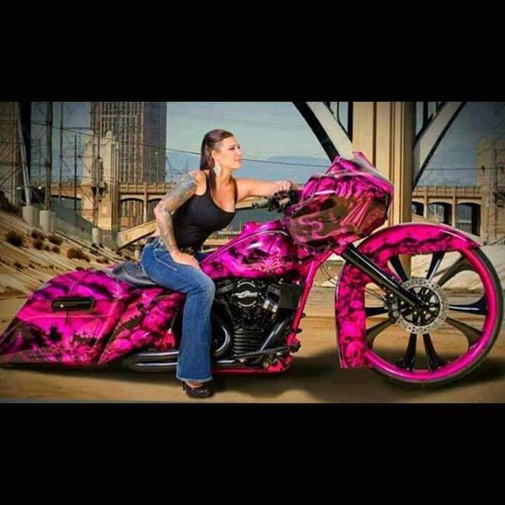 Girl on Pink and Black Bagger Motorcycle 1 of 17 Pictures in “Girls and Motorcycles” Album