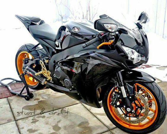 HONDA CBR 1000 RR Black and Orange ..... Time to get my black leather back out and on!