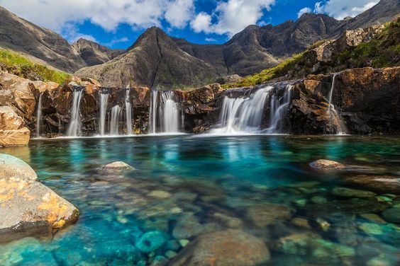 I didnt know a place like this existed but it looks amazing!! Scotland's Fairy Pools, Isles of Skye