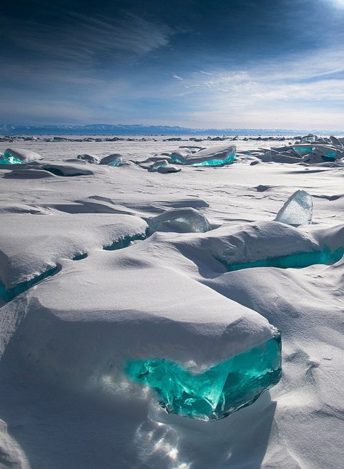 “In March, due to a natural phenomenon, Siberia’s Lake Baikal is particularly amazing to photograph. The temperature, wind and sun cause the ice crust to crack and form beautiful turquoise blocks or ice hummocks on the lake’s surface.” Photograph by Alex El Barto.