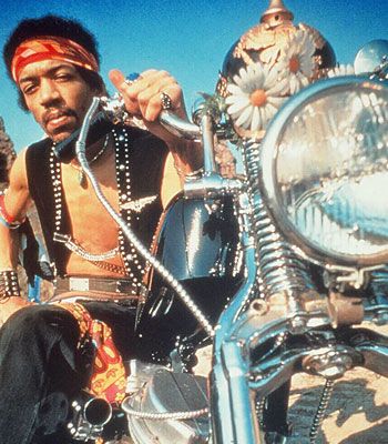 Jimi Hendrix - This musical legend died at 27 years old, leaving behind only 4 completed albums. They don’t talk much about him and his motorcycle but Jimi rode a 1964 Chopped Harley-Davidson Panhead. He was the 20th Century’s electric guitar master. Jimi Hendrix was innovative and his style combined fuzz, feedback and controlled distortion to make his sound so distinctive. If you followed him you would know that he couldn’t read or write music.