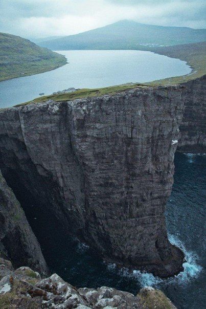 lake hanging over sea, island Vagar, Faroe islands, Denmark