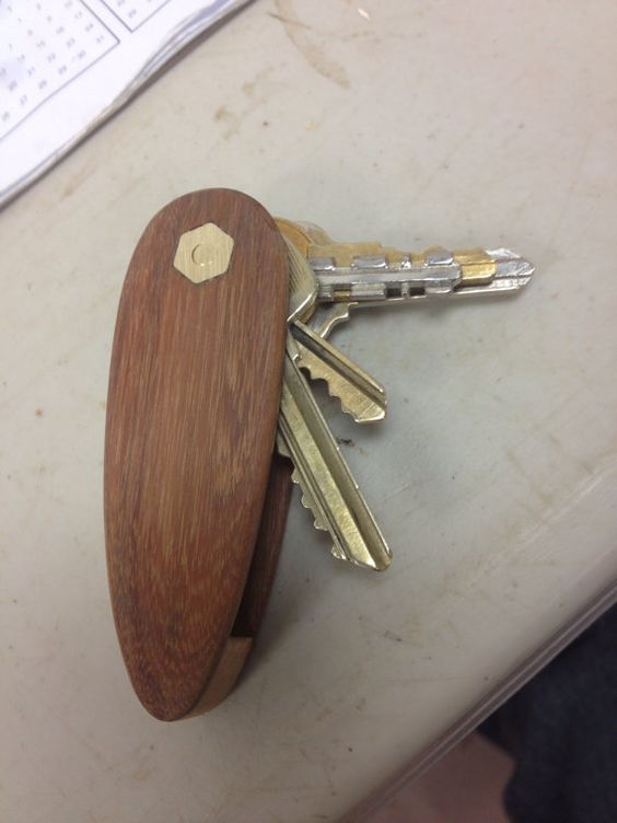 Made by my brother in law! Wood pocket knife style key holder by Wouldwork