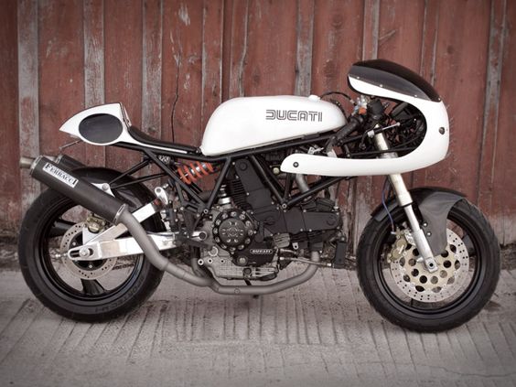Modern Ducati Monster 696 converted to old school Cafe Racer