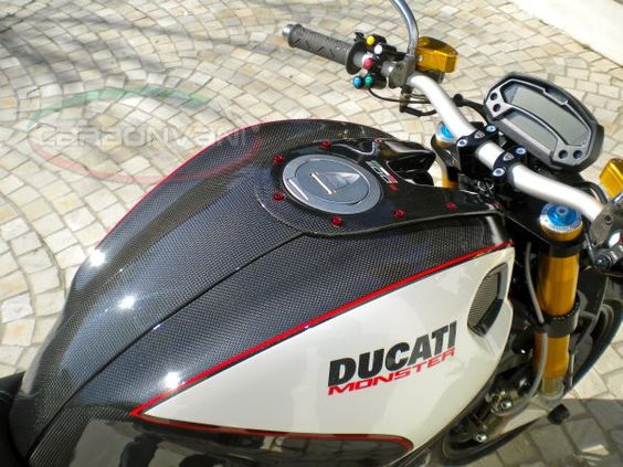 Painted carbon fiber gas tank cover on Monster 1100.