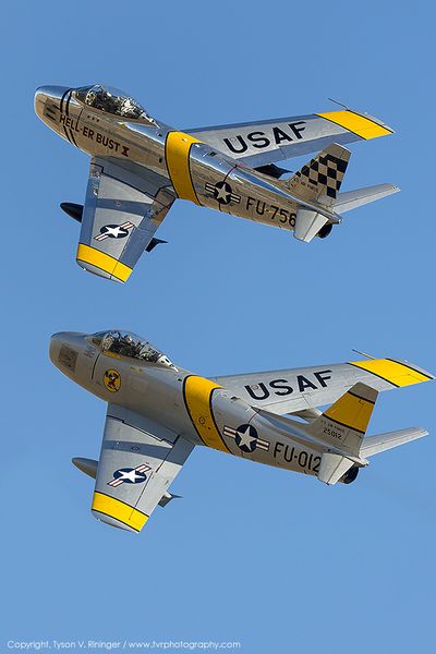 Pair of North American F-86 Sabre fighters.