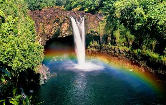 Rainbow Falls, Hawaii, where this happens all the time. | 15 Places You’d Probably Rather Be Right Now