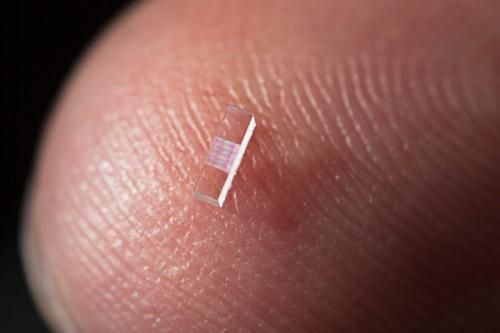 Researchers demonstrate 'accelerator on a chip' | SLAC and Stanford scientists used nanofabricated chips of fused silica just three millimeters long to accelerate electrons at a rate 10 times higher than conventional particle accelerator technology.