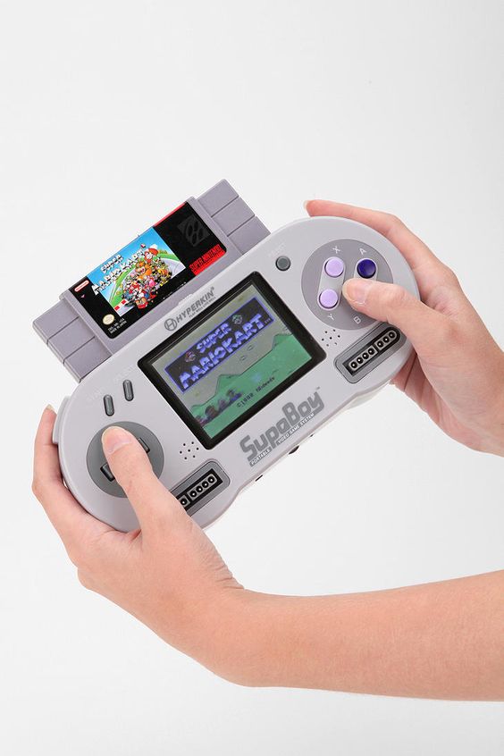 SHUT UP! You can play old school Super Nintendo games on this- Supaboy Portable Game Console