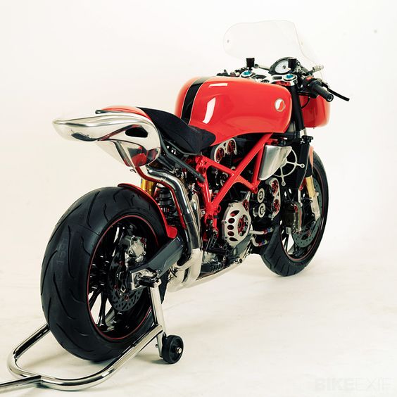 STEFFANO-DUCATI CAFE9 999 |   Chassis has been modified to carbon fiber bodywork that helps reduce the weight by 20 lbs over a stock 999. Leo Vince SBK headers are matched to an extraordinary hand-formed aluminum exhaust system; at first glance, it appears to be part of the body at the rear. A BrakeTech Axis full-floating brake system is hooked up to Brembo monoblocs for maximum stopping power, and the wheels are PVM forged alloy. The rearsets are Cycle Cat solid billet aluminum items.