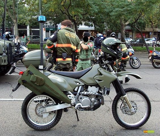 Suzuki DRZ-400 in service in Spain - I've been wondering how to strap a rifle to the