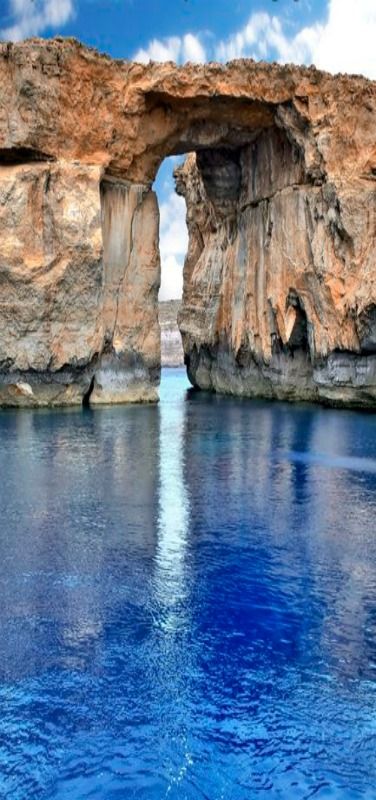 The Azure window is a limestone natural arch on the Maltese island of Gozo. It is situated near Dwejra Bay on the Inland Sea, Malta.