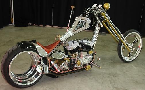 The Chronic - The Chronic is Billy Lane’s third hubless chopper. Cronic is a jockey or 'suicide' shift so named because the rider must take one hand off of the handlebars in order to move the lever and change gears. The bike drips with Choppers Inc