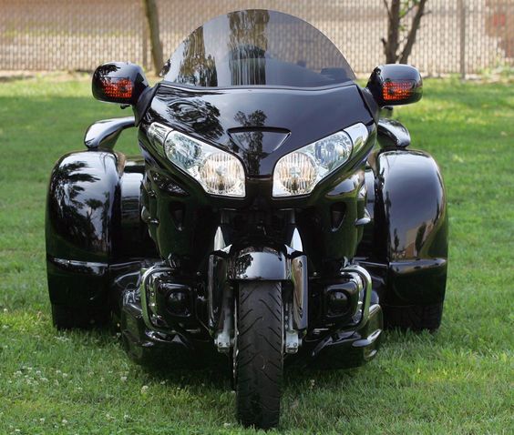 The head on view of the Stealth Gold Wing Trike at Paradise Bikes and Trikes. Photograph by Skip Peterson/Wheels