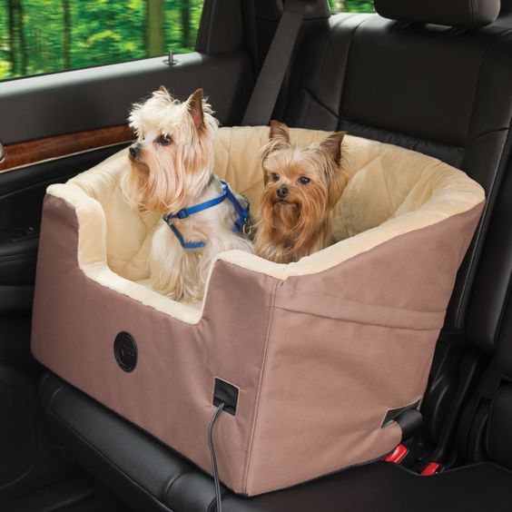 The Heated Pet Car Seat - Hammacher Schlemmer - This is the only pet car seat that is heated to provide cozy, warm quarters for pets during travel.