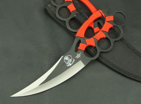 The KnuckleDuster Cobra Knife. 5 1/2 in. blade 10’ overall. Knife Pics