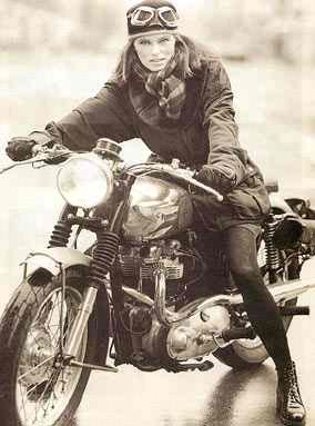 Vintage female motorcyclist. Ready to ride!