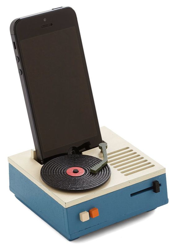 While you're at home or working away, keep your phone propped up in this turntable-inspired EP phone stand ($20), which is crafted from wood and has a slot for a charging cord of any size.