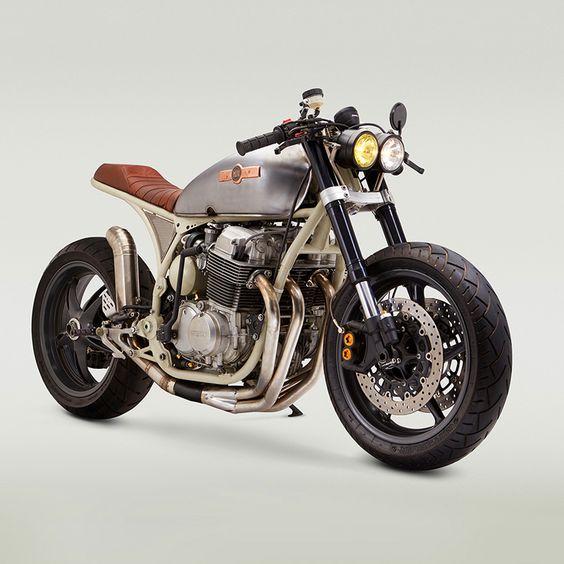 With a big bore kit and YZF-R6 suspension, this new Honda CB 750 from Classified Moto goes like a rocket. And it's painted to match one, too.