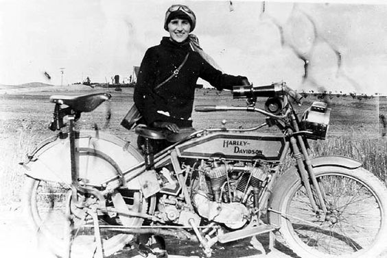 Woman with a Harley-Davidson in 1912