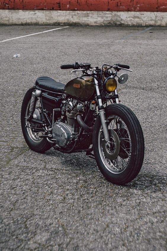 Yamaha Xs 650. Low, firestone-clad brat bike, with a glossy brass patina tank