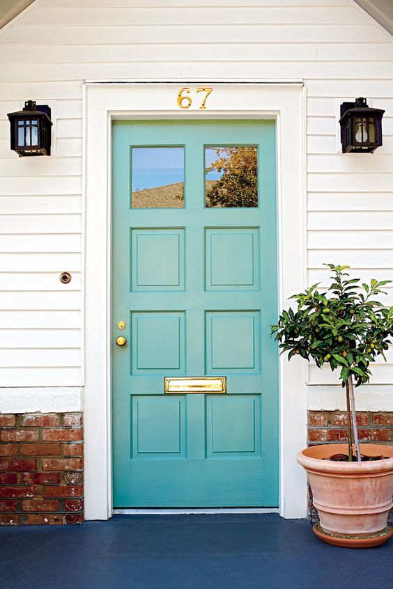 13 Bold Colors for Your Front Door: Charleston Light Teal Front Door