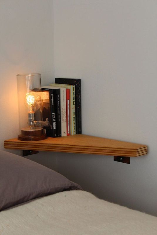 #7. Install a corner shelf where there is no room for a nightstand! | 29 Sneaky Tips For Small Space Living
