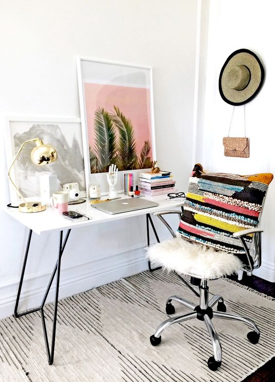 7 key elements for a stylish & whimsical work space // white desk, colorful textured pillow, white desk chair, palm print, striped rug & gold lamp #office #interiordesign #homedecor