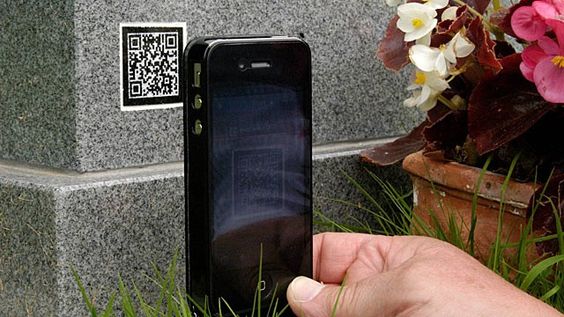 A funeral home in Britain is attaching tiny digital codes to headstones, giving visitors the chance to see, hear, even experience the lives of the dead.