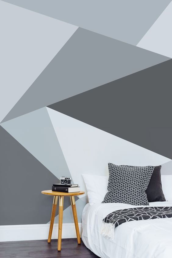 A modern twist on a monochrome themed bedroom. Create your own Scandi inspired space with this sleek geometric wallpaper design.