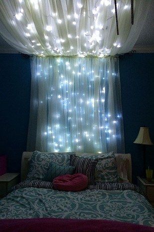 Add some string lights to create an extra whimsical effect. | 14 Dreamy DIY Canopy Beds That Will Transform Your Bedroom