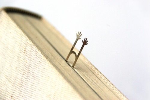 bookmark looks like tiny people trapped in a book