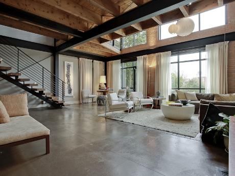 Contemporary Loft - Talk about spacious! I love the contrast between the industrial and woody, cabin-like themes.