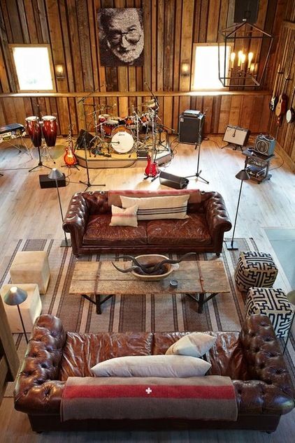 Example of instruments and furniture co existing but likely would go in a bedroom not a living space and up on walls not stands, Man cave