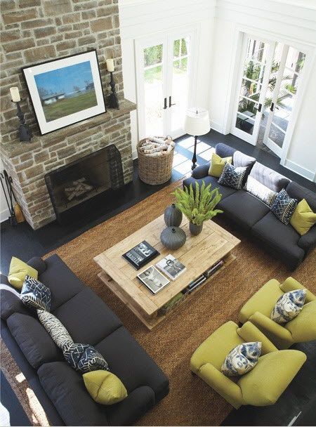 Furniture Layout Ideas : Balance and Symmetry - Kylie M Interiors. Learn how to create a furniture layout. Love this living room with gray couches, jute rug and green chartreuse chairs. #FurnitureLayout #LivingRoomIdeas #Fireplace
