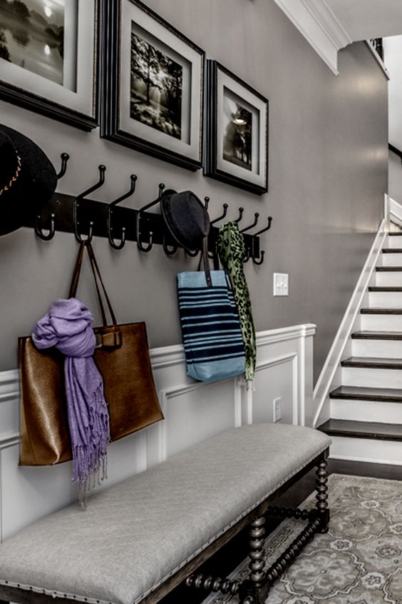 Gray is the new black. Look at how the colors of the accessories stand out in this entryway. | Pulte Homes