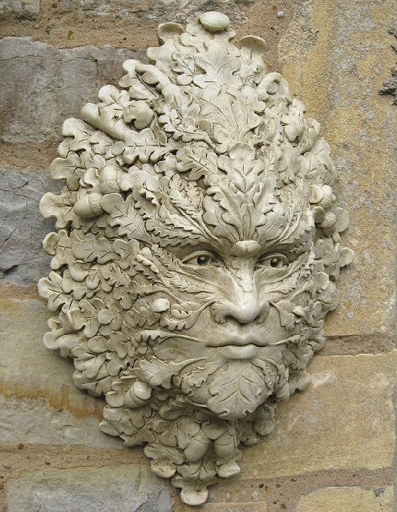 Green man with oak leaves and acorn, for the garden