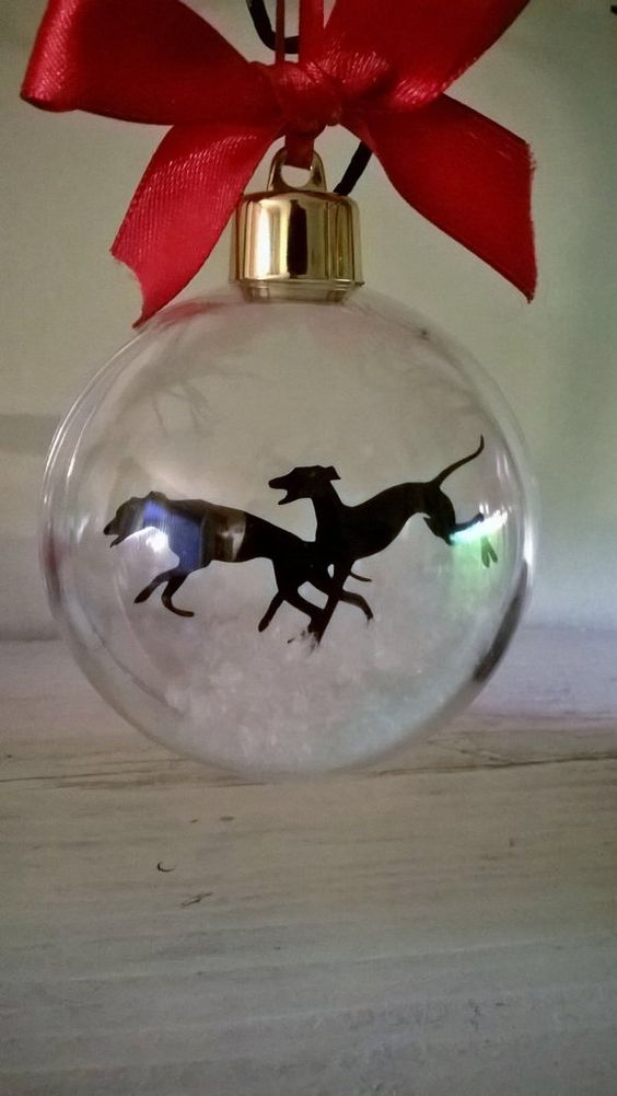 greyhounds in snow ornament