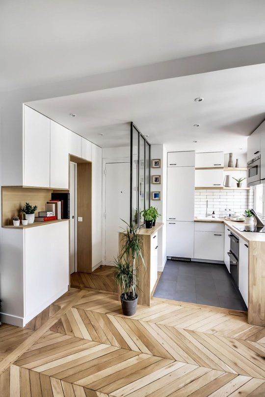 herringbone wood floor; clever divider between entry and kitchen